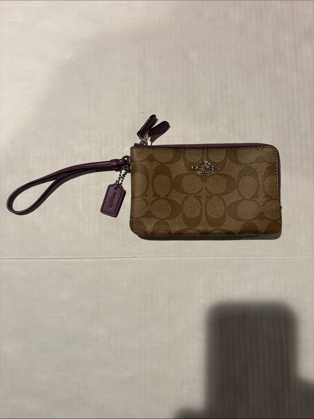 Coach Brown Signature Canvas Wristlet with Purple Trim and Strap